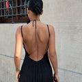 Enigmatic Backless Beauty