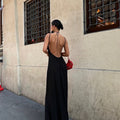 Enigmatic Backless Beauty