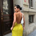 Enigmatic Backless Beauty