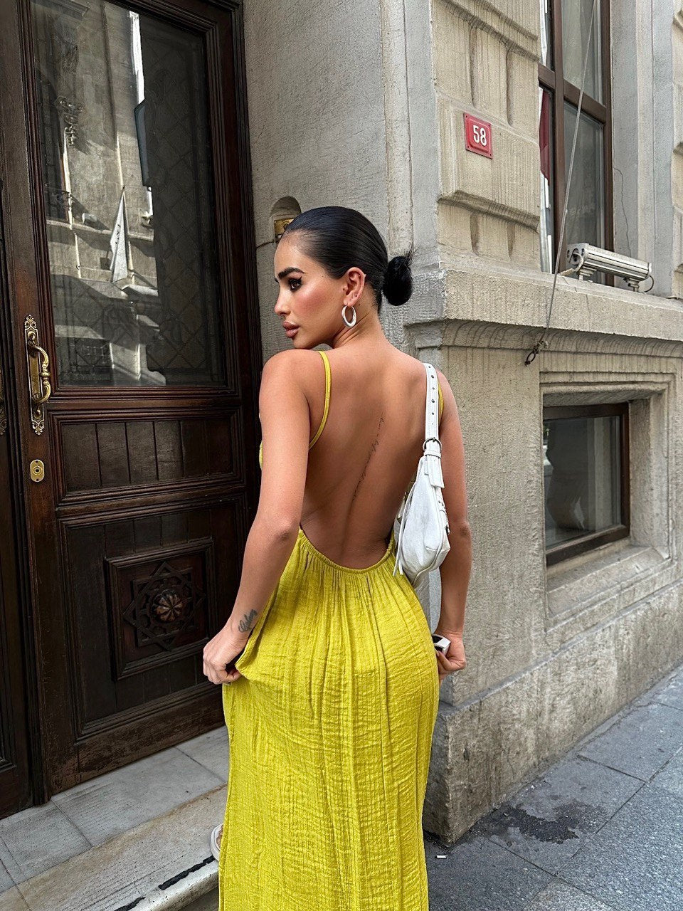 Enigmatic Backless Beauty