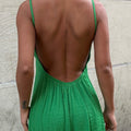 Enigmatic Backless Beauty